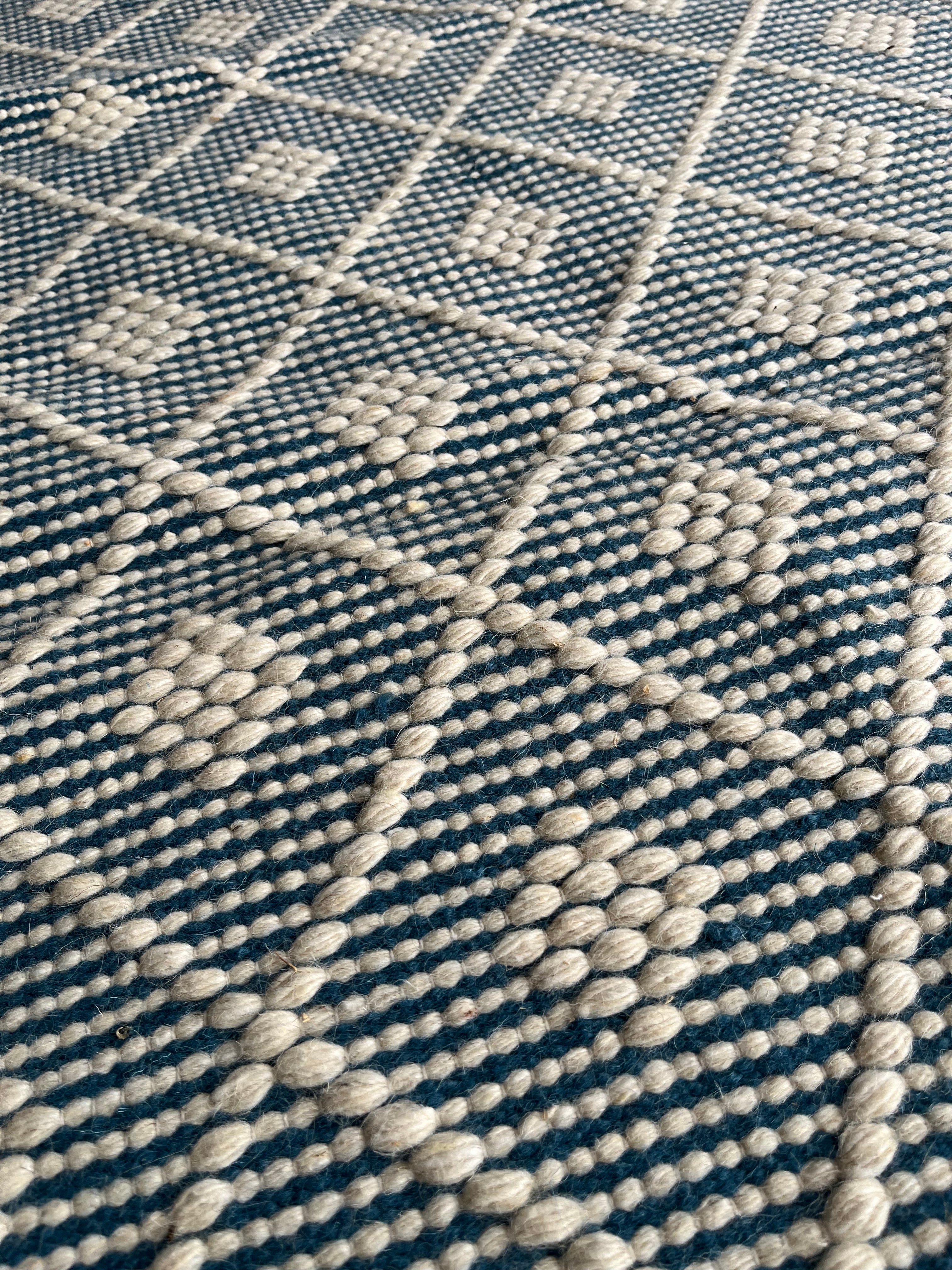 Teal diamond patterned kilim