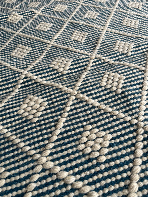 Teal diamond patterned kilim