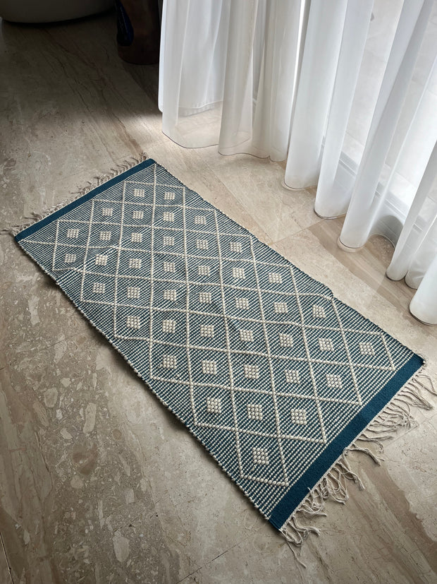 Teal diamond patterned kilim